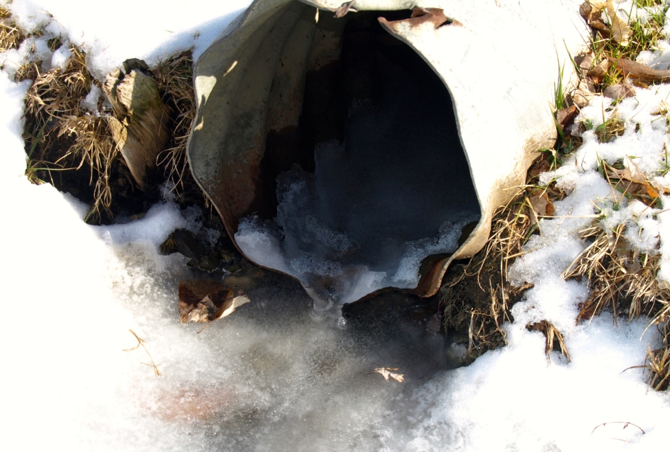 Frozen sewer lines during winter weather, showing underground sewer pipes affected by cold temperatures, illustrating can sewer lines freeze, common winter plumbing problems, and professional sewer line repair by Neighborhood Plumbing. Call us today for help with can sewer lines freeze, can sewer pipes freeze in winter, frozen sewer line, frozen sewer pipes, main sewer line frozen, sewer line freezing temperature, signs of a frozen sewer line, how to tell if sewer line is frozen, sewer line frozen in cold weather, sewage pipe freezing, underground sewer line frozen, sewer backup in winter, toilet won’t flush frozen pipes, winter sewer problems, emergency sewer repair, sewer line repair, sewer line replacement, sewer line thawing service, frozen pipe repair, winter plumbing services, residential sewer repair, main sewer line repair, plumbing repair near me, sewer line repair near me, frozen sewer line repair near me, emergency plumber near me, winter plumbing repair near me.