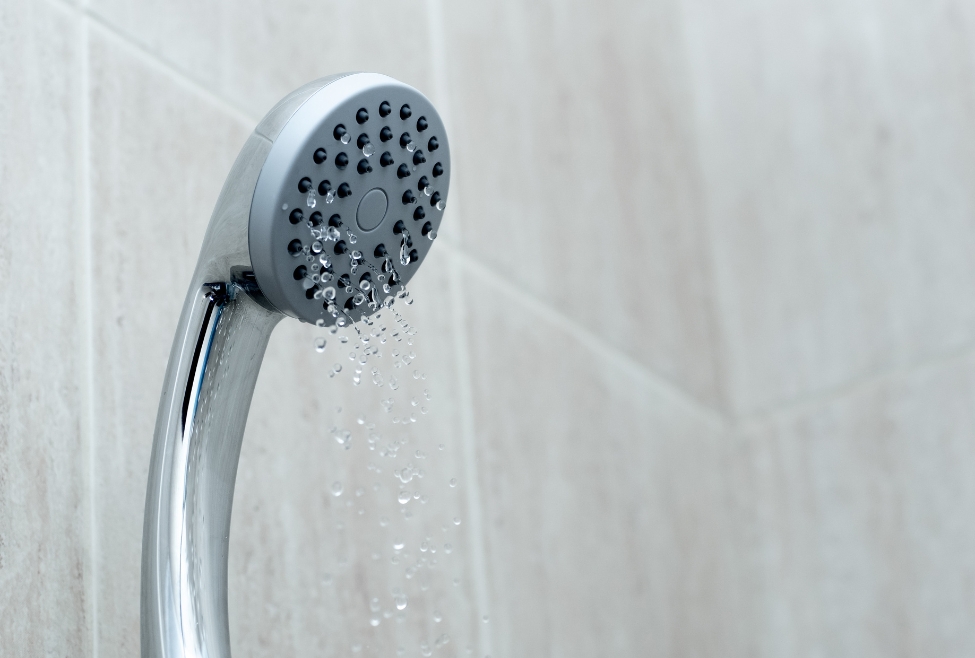Low water pressure in a home faucet, illustrating how to increase water pressure in home with plumbing solutions from Neighborhood Plumbing, including water line inspection, pressure regulator adjustment, and pipe maintenance. Reach out to us now for help with how to increase water pressure in home, increase home water pressure, fix low water pressure in house, boost water pressure in bathroom, improve water flow in home, water pressure problems near me, residential water pressure solutions, plumbing services for low water pressure, water line inspection, pressure regulator repair, pipe maintenance for water pressure, water pressure plumbing near me, low water pressure troubleshooting, increase faucet water pressure, water pressure pump installation, water pressure repair service, water pressure issues in kitchen, water pressure problems in shower, Neighborhood Plumbing water pressure solutions, plumbing experts for low water pressure, home water pressure service near me.