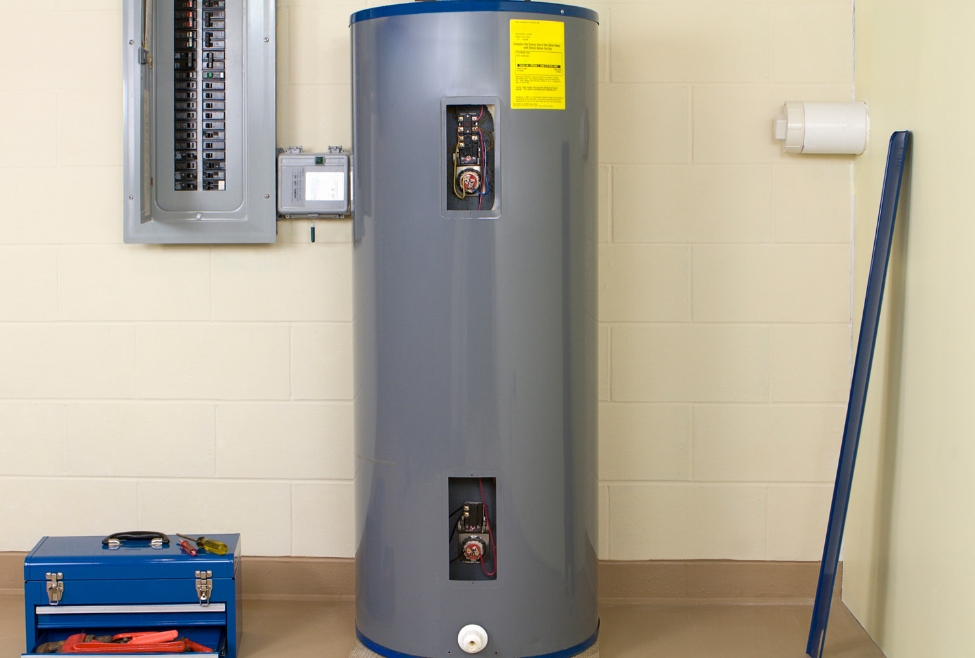 Residential water heater unit installed in a home, representing what is the best hot water heater to buy, including options like tank and tankless systems for energy efficiency, reliable hot water, and professional water heater installation and repair services by Neighborhood Plumbing. Contact us today for help with what is the best hot water heater to buy, best water heater for home, best hot water heater options, tank vs tankless water heater, best tankless water heater system, best gas water heater, best electric water heater, how to choose a water heater, water heater buying guide, energy efficient water heater options, high efficiency hot water heater, best water heater for large family, best water heater for small house, water heater installation services, water heater repair services, water heater replacement services, tankless water heater installation, hot water heater repair near me, water heater installation near me, water heater replacement near me, emergency water heater repair near me, plumbing services near me, water heater leaking repair, no hot water fix, water heater maintenance services, residential water heater services, professional plumber for water heater near me.